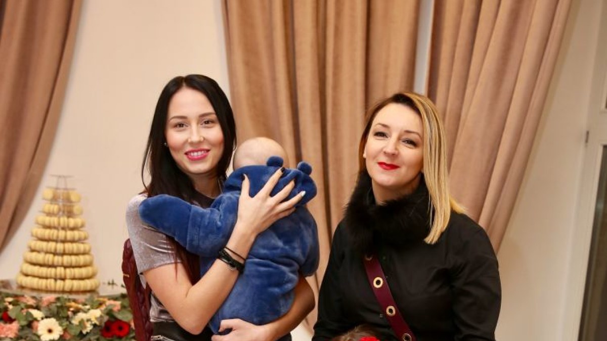 Gabrielė Rutkauskienė-Vasha su dukterimi Adrija, mama Viktorija Mauručaite ir sesute Angela / Teodoro Biliūno / BNS nuotr.