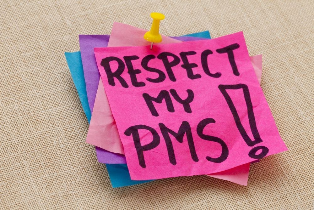 Užrašas: "Gerbk mano PMS!" / Fotolia nuotr.
