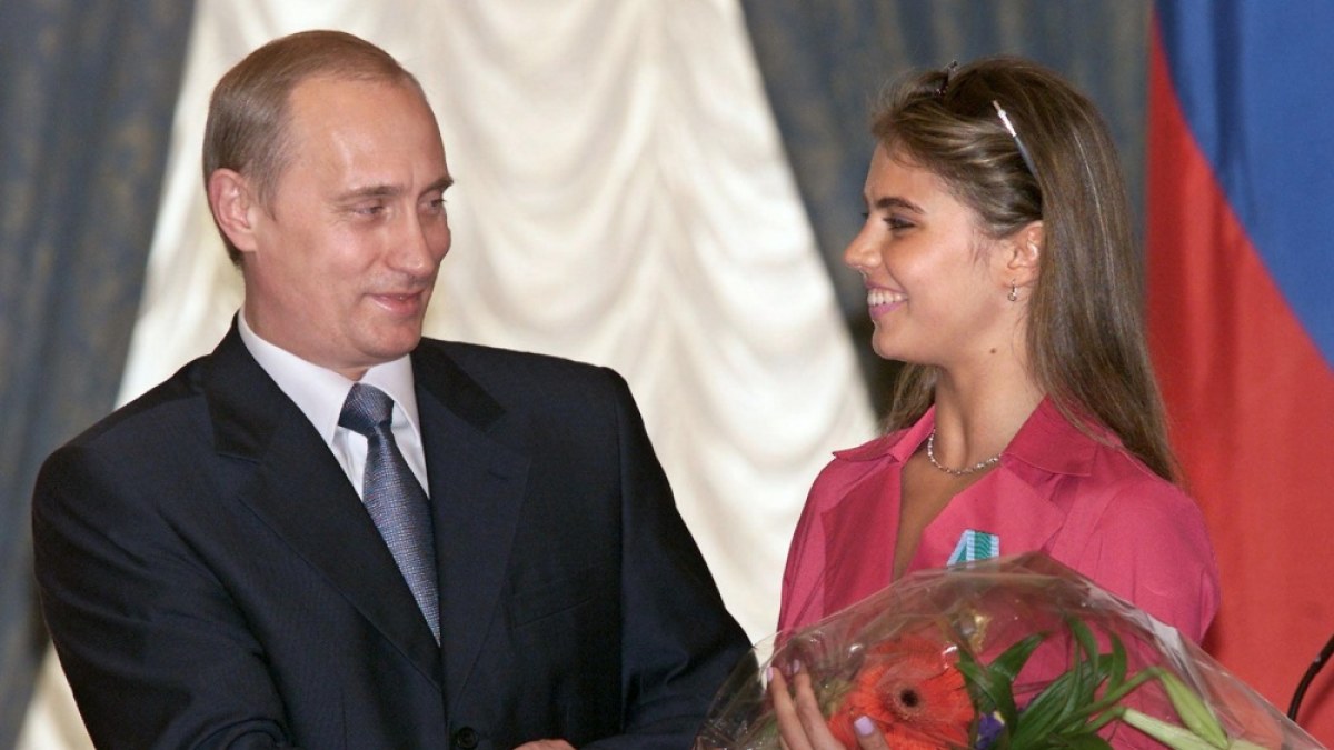 Vladimiras Putinas ir Alina Kabajeva / AFP/„Scanpix“ nuotr.