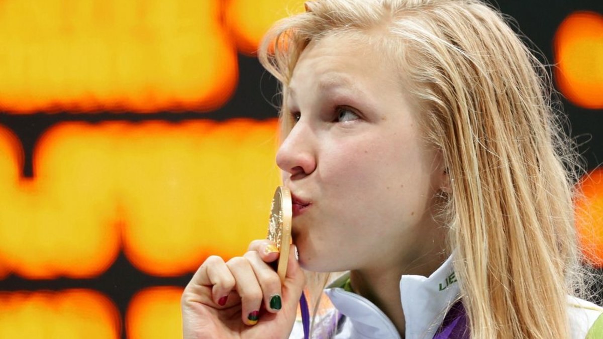 Rūta Meilutytė iš Lietuvos laimėjo aukso medalį 100 m plaukimo krūtine rungtyje / „Scanpix“ nuotr.