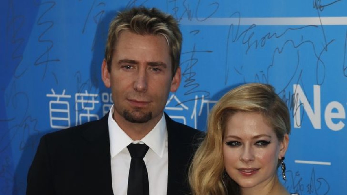 Kanadiečių dainininkė Avril Lavigne su vyru Chadu Kroegeriu / „Reuters“/„Scanpix“ nuotr.