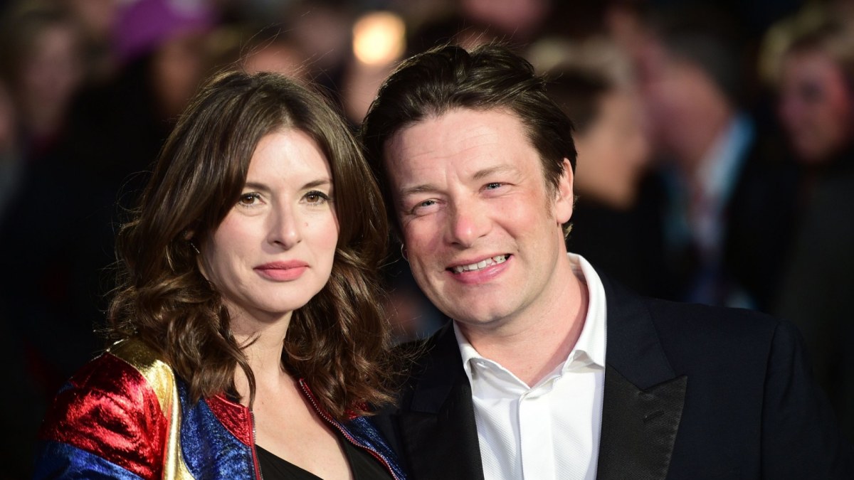 Jamie Oliveris su žmona Jools  / AFP/„Scanpix“ nuotr.