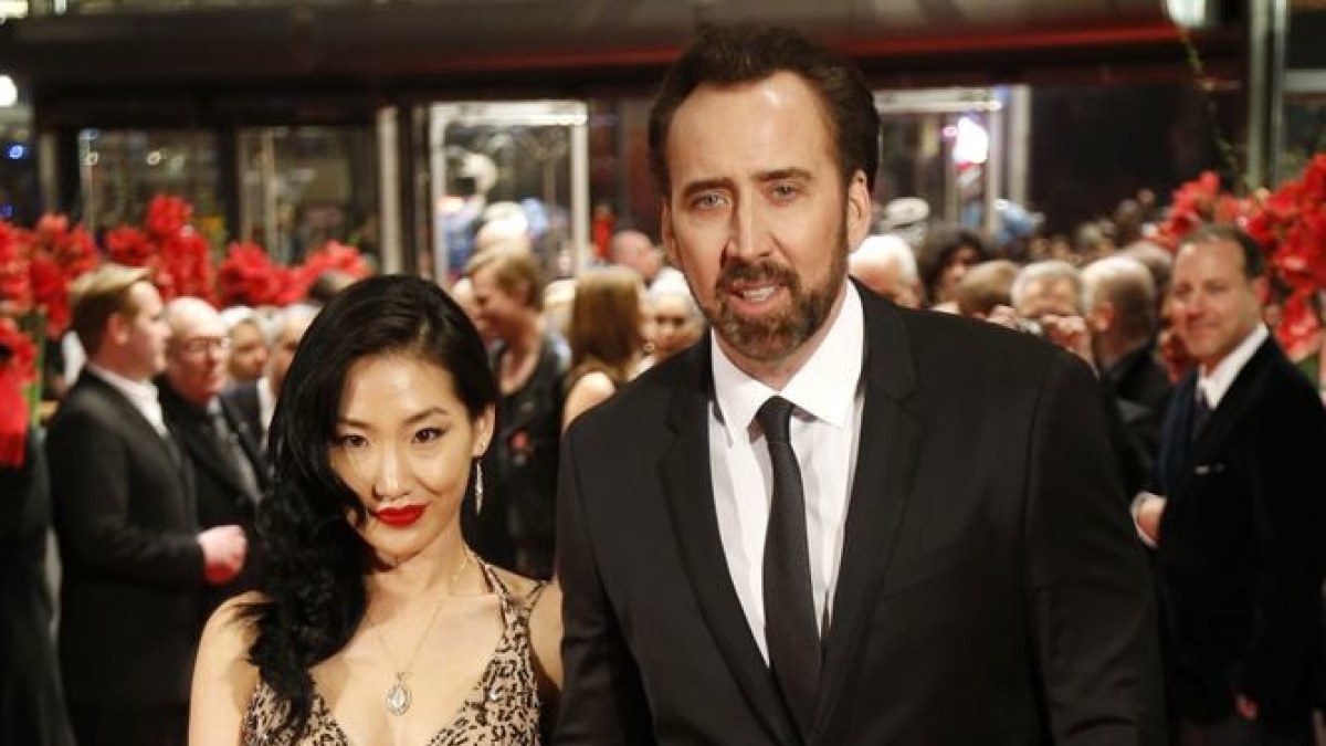 Nicolas Cage'as su žmona Alice Kim / „Reuters“/„Scanpix“ nuotr.