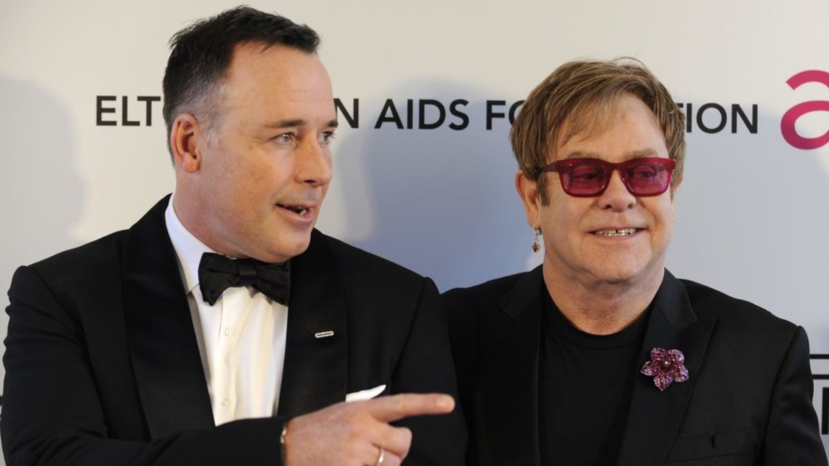  Davidas Furnishas ir Eltonas Johnas / „Reuters“/„Scanpix“ nuotr.
