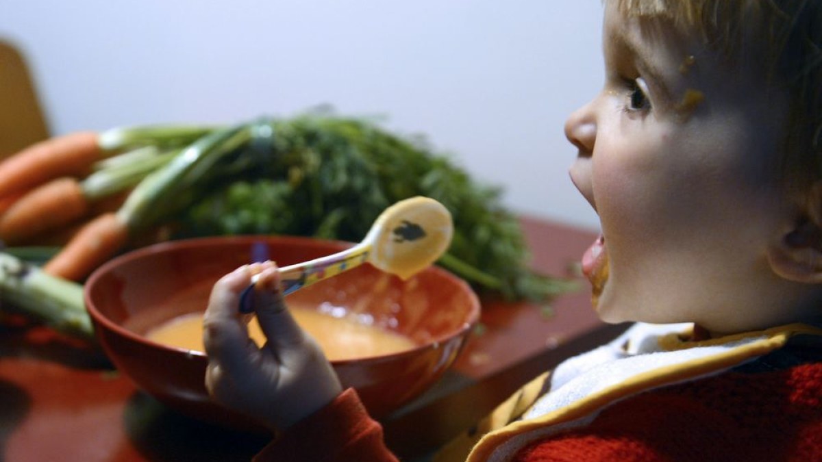 Vaikų mityba / AFP/„Scanpix“ nuotr.