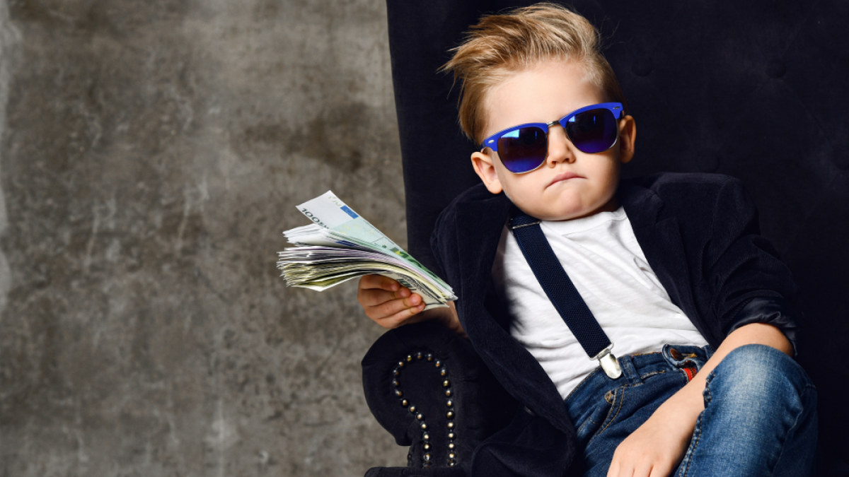 Vaikas ir pinigai / Shutterstock nuotr.