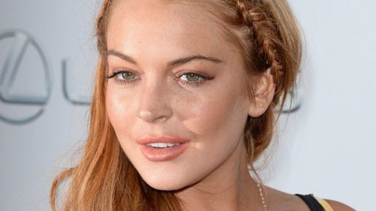 Lindsay Lohan filmo „Pats baisiausias filmas 5“ premjeroje / AFP/„Scanpix“ nuotr.