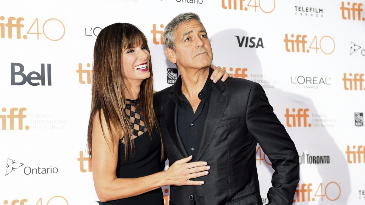 Sandra Bullock ir George'as Clooney / „Scanpix“/„PA Wire“/„Press Association Images“ nuotr.