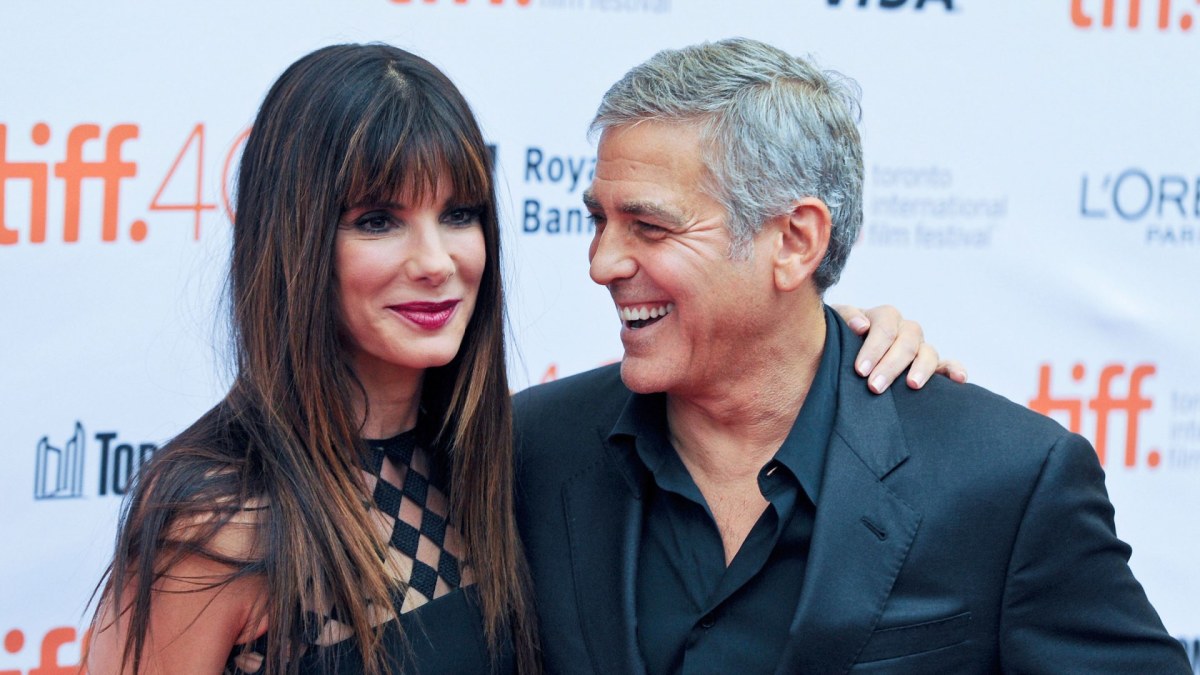 Sandra Bullock ir George'as Clooney / „Scanpix“/„Sipa USA“ nuotr.