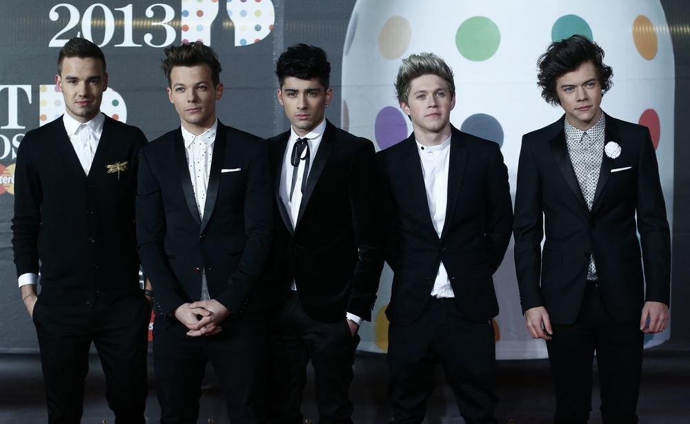 Vaikinų grupė „One Direction“ / AFP/„Scanpix“ nuotr.