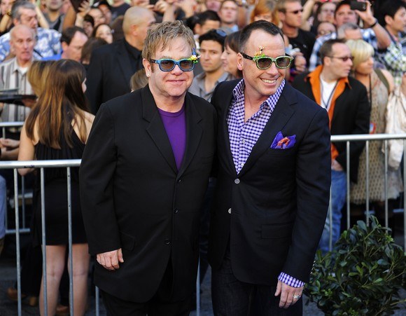 Eltonas Johnas ir Davidas Furnishas / AFP/„Scanpix“ nuotr.
