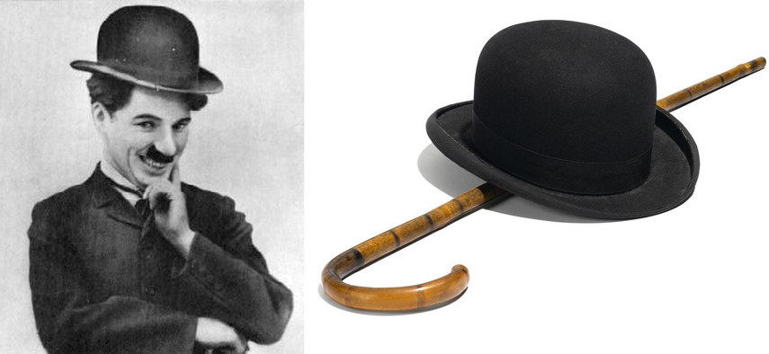 Charlie Chaplinas ir jo žymieji aksesuarai – skrybėlaitė ir lazdelė / „Scanpix“ nuotr.