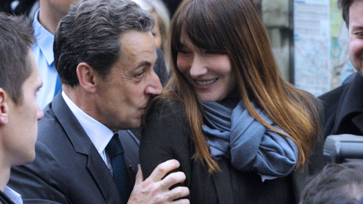 Buvęs Prancūzijos prezidentas Nicolas Sarkozy su savo žmona Carla Bruni-Sarkozy / AFP/„Scanpix“ nuotr.