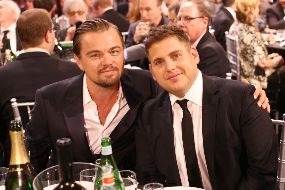 Leonardo DiCaprio ir Jonah Hillas / AFP/„Scanpix“ nuotr.