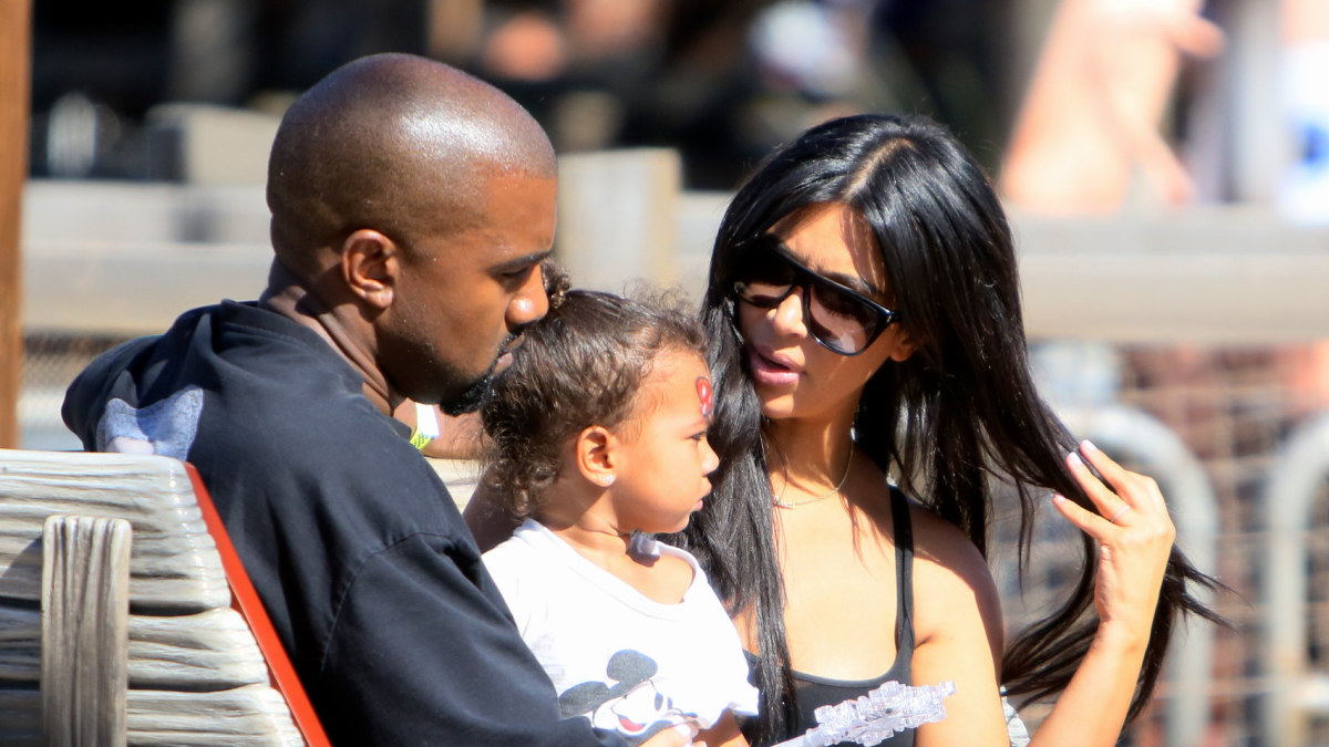 Kanye Westas, Kim Kardashian ir North West / „Scanpix“ nuotr.