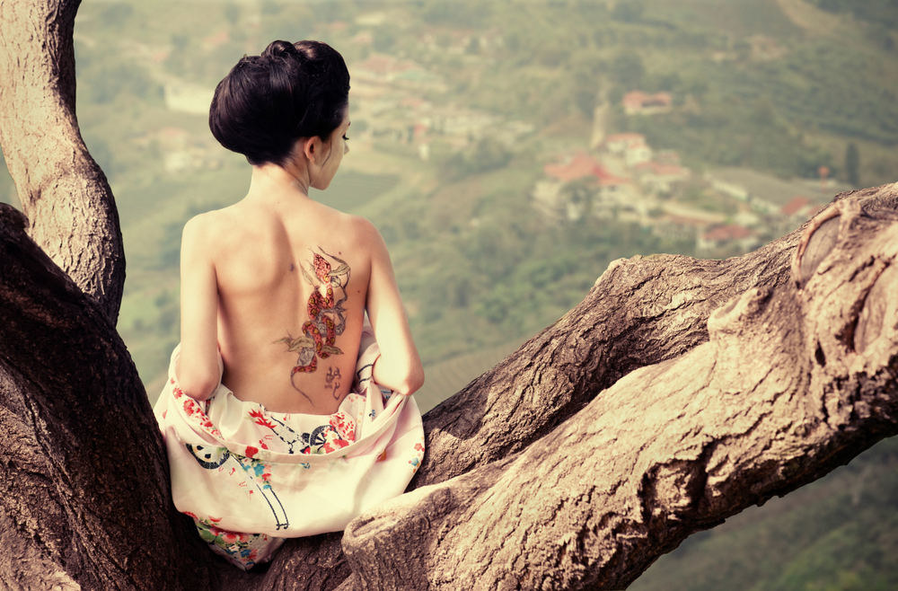 Mergina su tatuiruote / Fotolia nuotr.