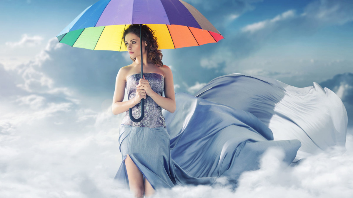 Mergina su skėčiu / „Fotolia“ nuotr.
