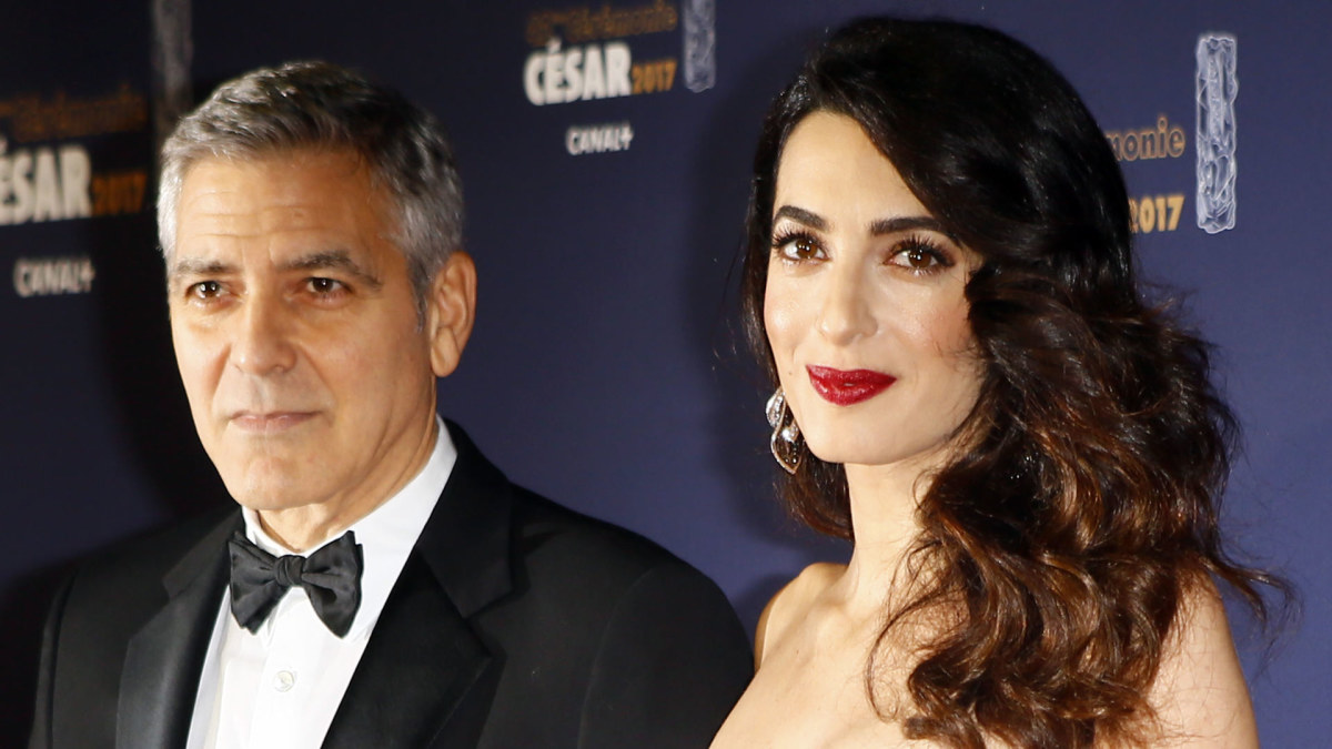 George'as ir Amal Clooney / „Scanpix“ nuotr.