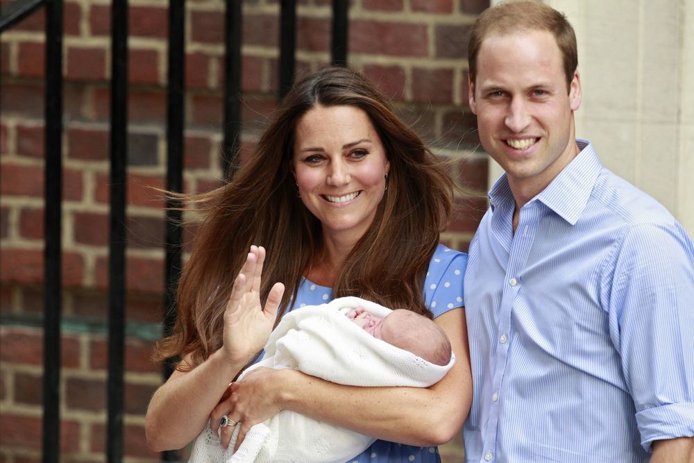 Kembridžo hercogienė Catherine ir princas Williamas su sūnumi / „Reuters“/„Scanpix“ nuotr.