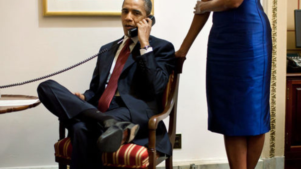 Kas čia valdo? Michelle Obama dažnai padeda vyrui priimti sprendimus.    / „Reuters“/„Scanpix“ nuotr.