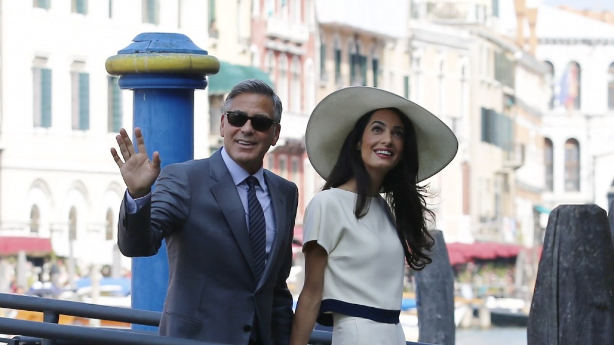 George'as Clooney ir Amal Alamuddin / AFP/„Scanpix“ nuotr.