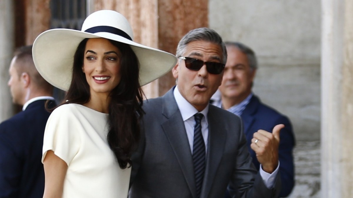 George'as Clooney ir Amal Alamuddin / AFP/„Scanpix“ nuotr.