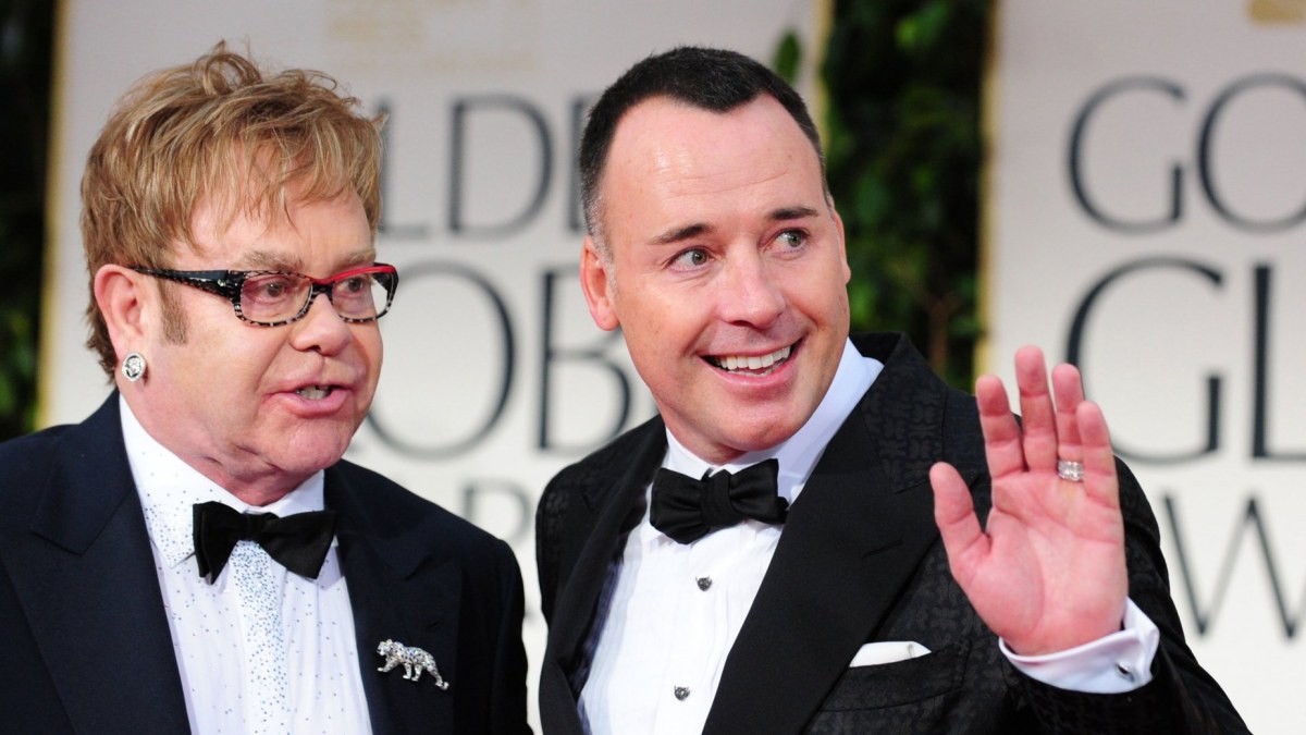 Eltonas Johnas ir Davidas Furnishas / AFP/„Scanpix“ nuotr.