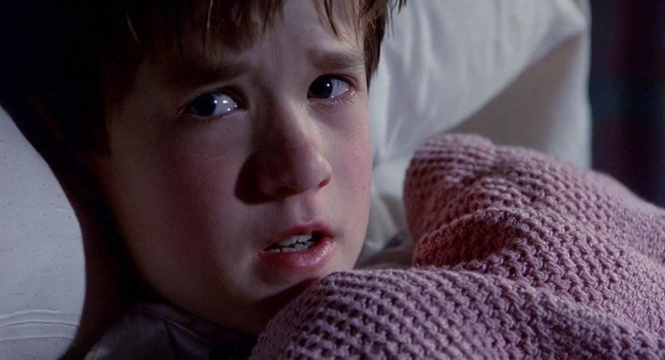 Haley Joelis Osmentas vaikystėje / Kadras iš filmo „Šeštasis pojūtis“