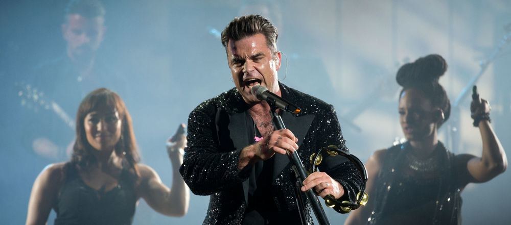  Robbie Williamso koncertinio turo akimirka / „Scanpix“ nuotr.