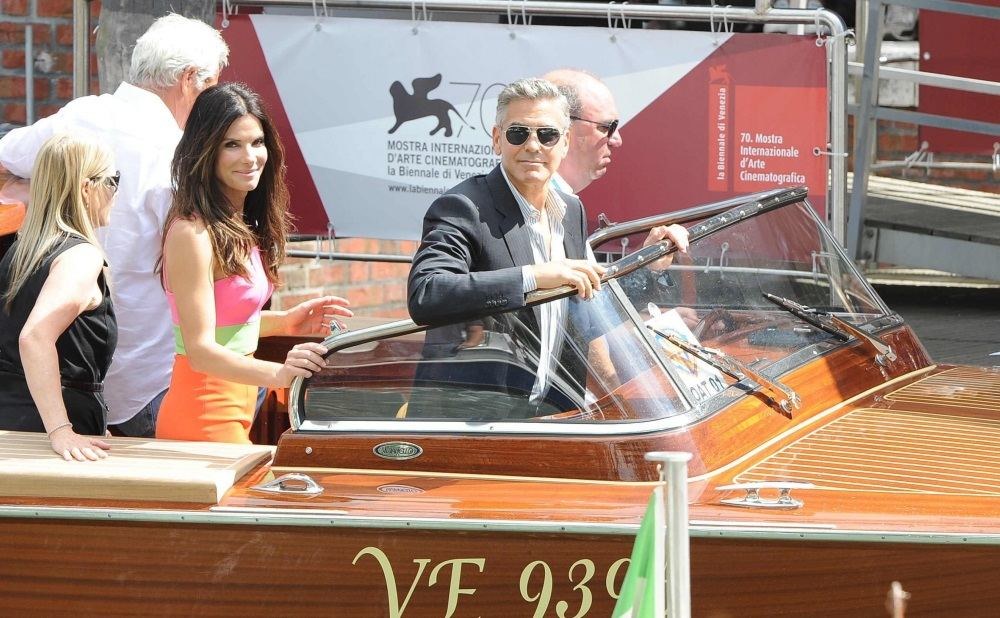 George'as Clooney ir Sandra Bullock Venecijos kino festivalyje / „Scanpix“ nuotr.