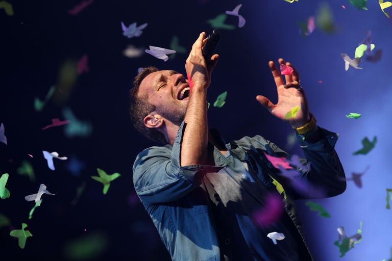 „Coldplay“ lyderis Chrisas Martinas / AFP/„Scanpix“ nuotr.