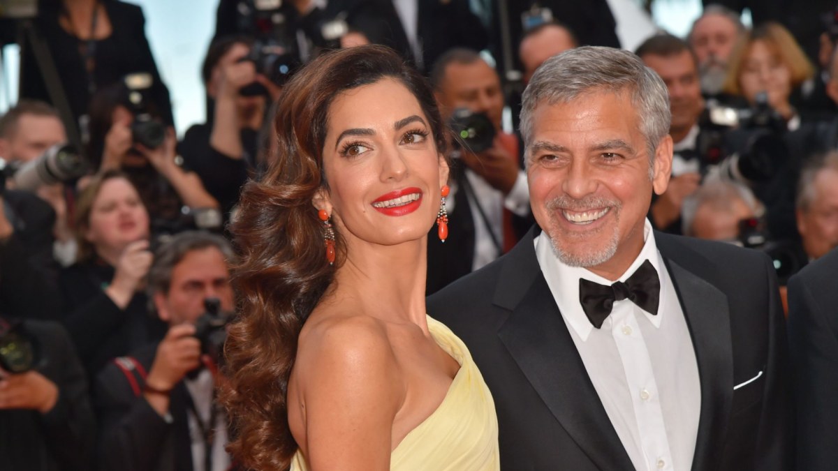 George'as Clooney su žmona Amal Clooney / AFP/„Scanpix“ nuotr.