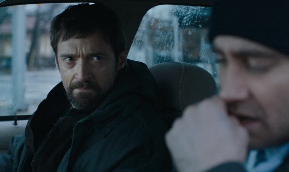 Hugh Jackmanas ir Jake’as Gyllenhaalas / Kadras iš filmo „Kaliniai“