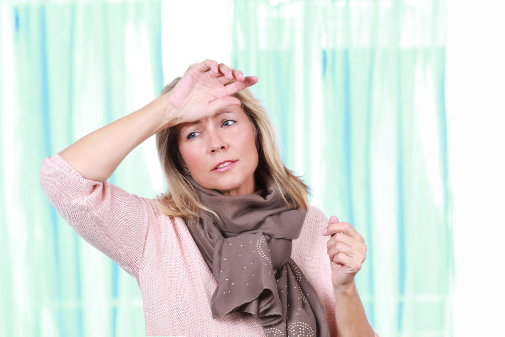 Moterį kamuoja menopauzė / Shutterstock nuotr.