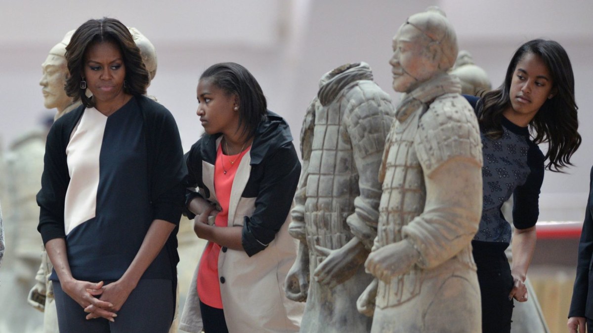 Michelle Obama su dukterimis / AFP/„Scanpix“ nuotr.