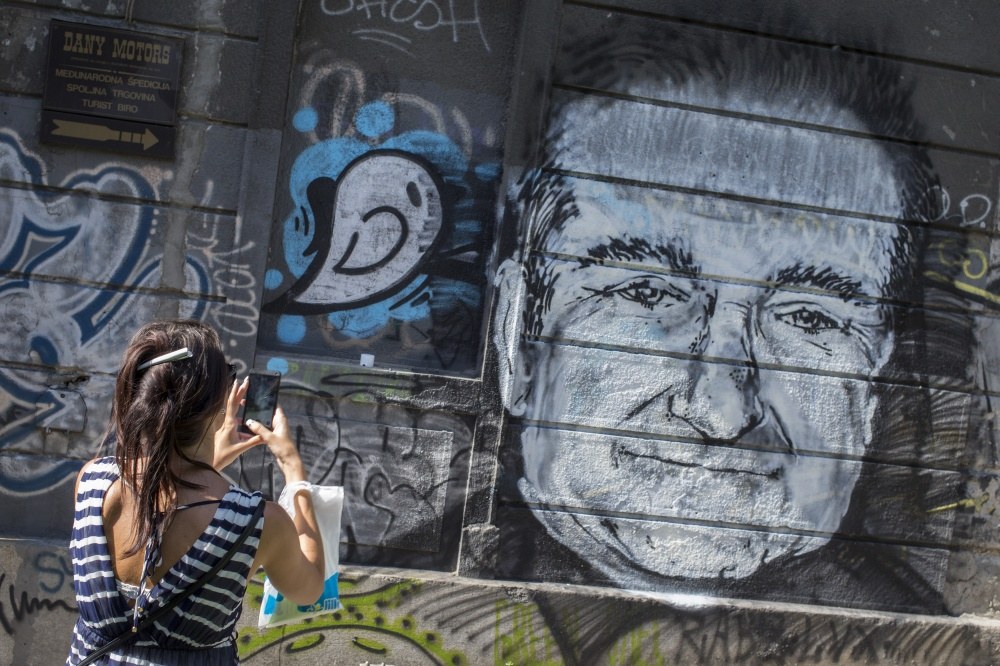 Robino Williamso portretas ant sienos Belgrade / „Reuters“/„Scanpix“ nuotr.